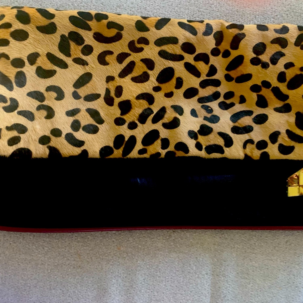 Steve Madden leopard front clutch.